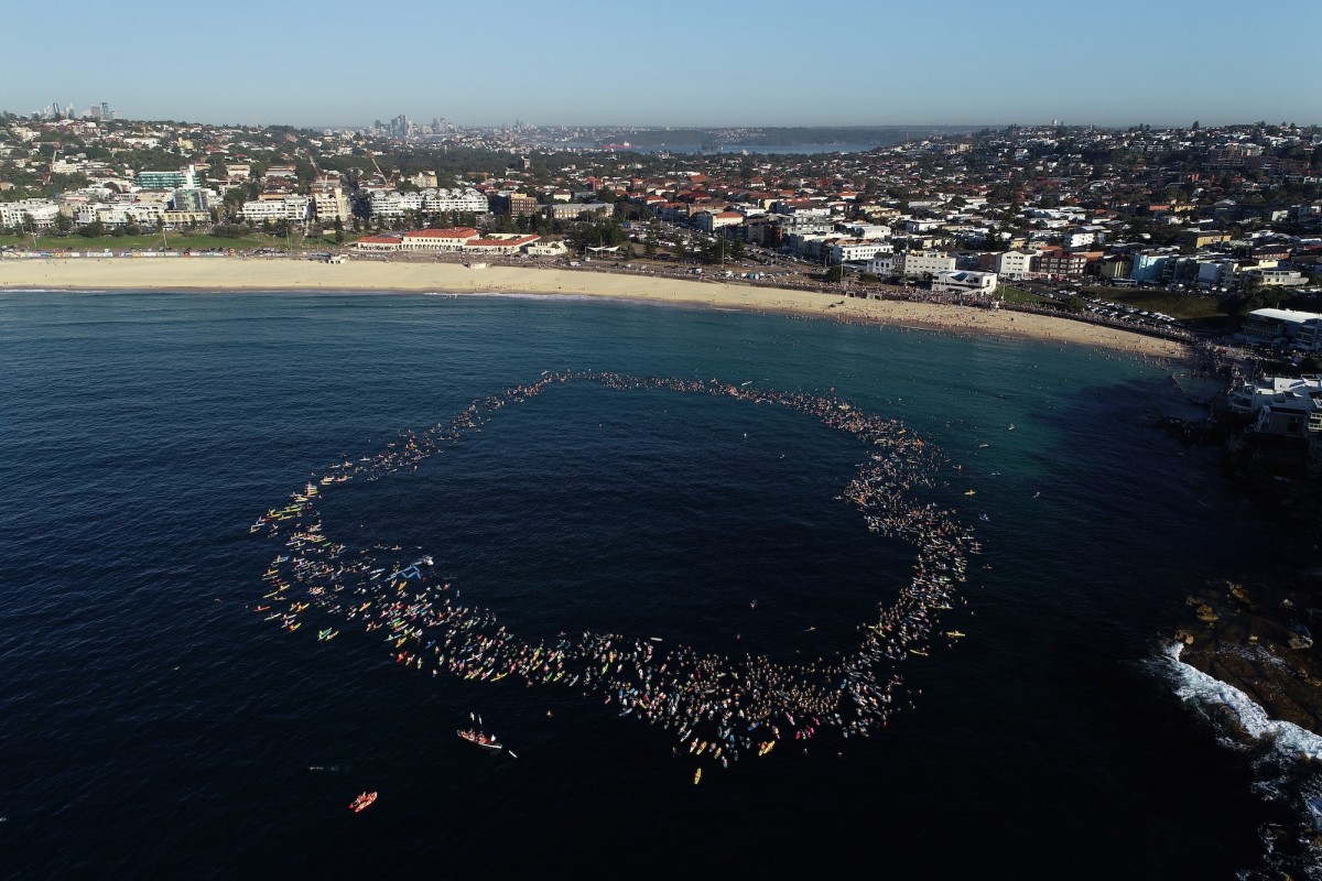 Bondi Beach Community Honors Attack Victims with Traditional Paddle-Out Ceremony