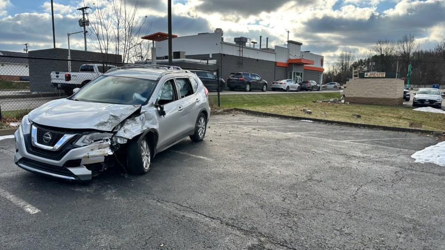 Vehicle Collides with Wall in Austintown, Driver Hospitalized